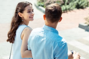 Time with husband. Curly appealing young wife feeling amazing while spending time with husband