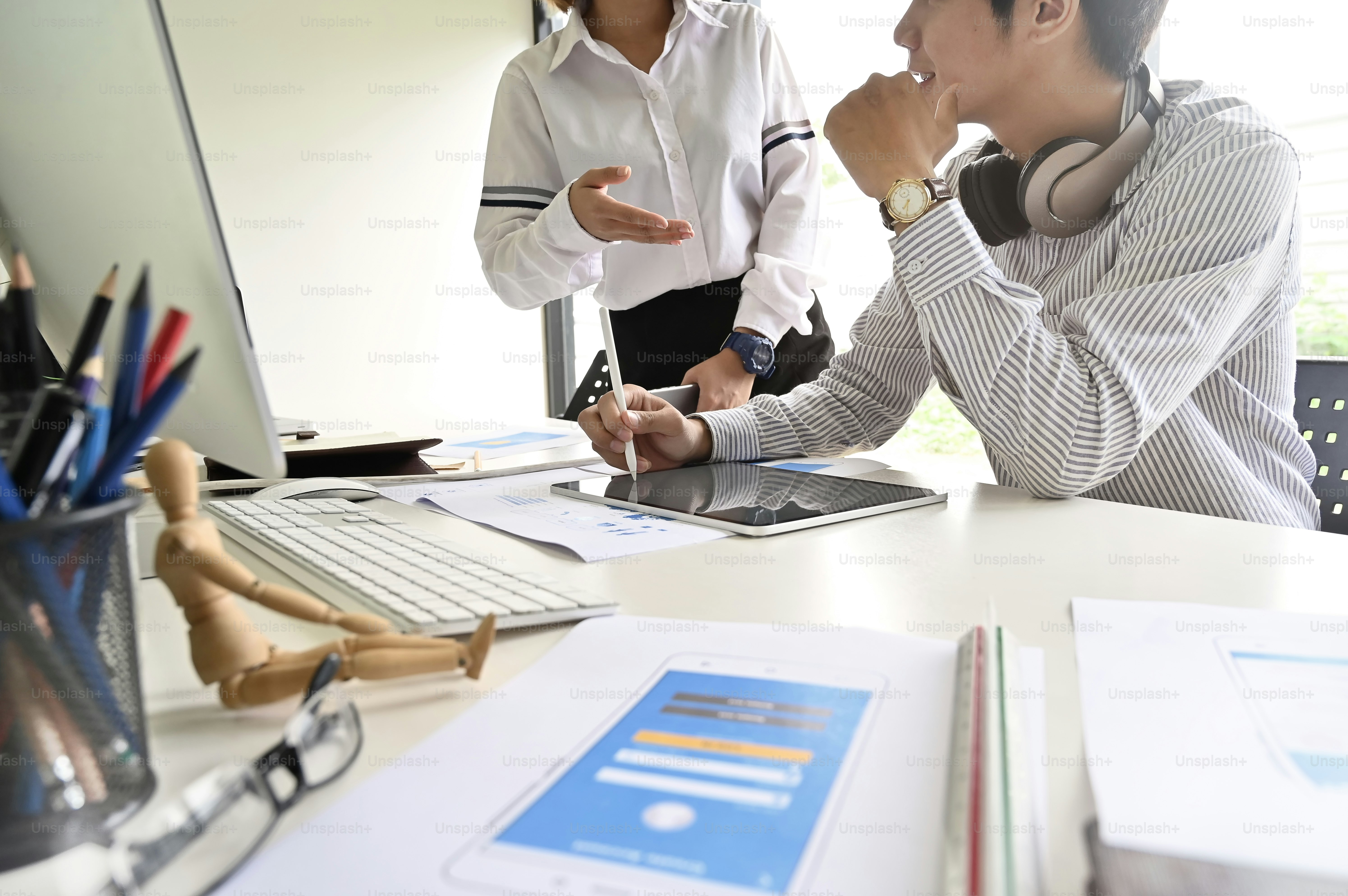 People collaborating on UI/UX design