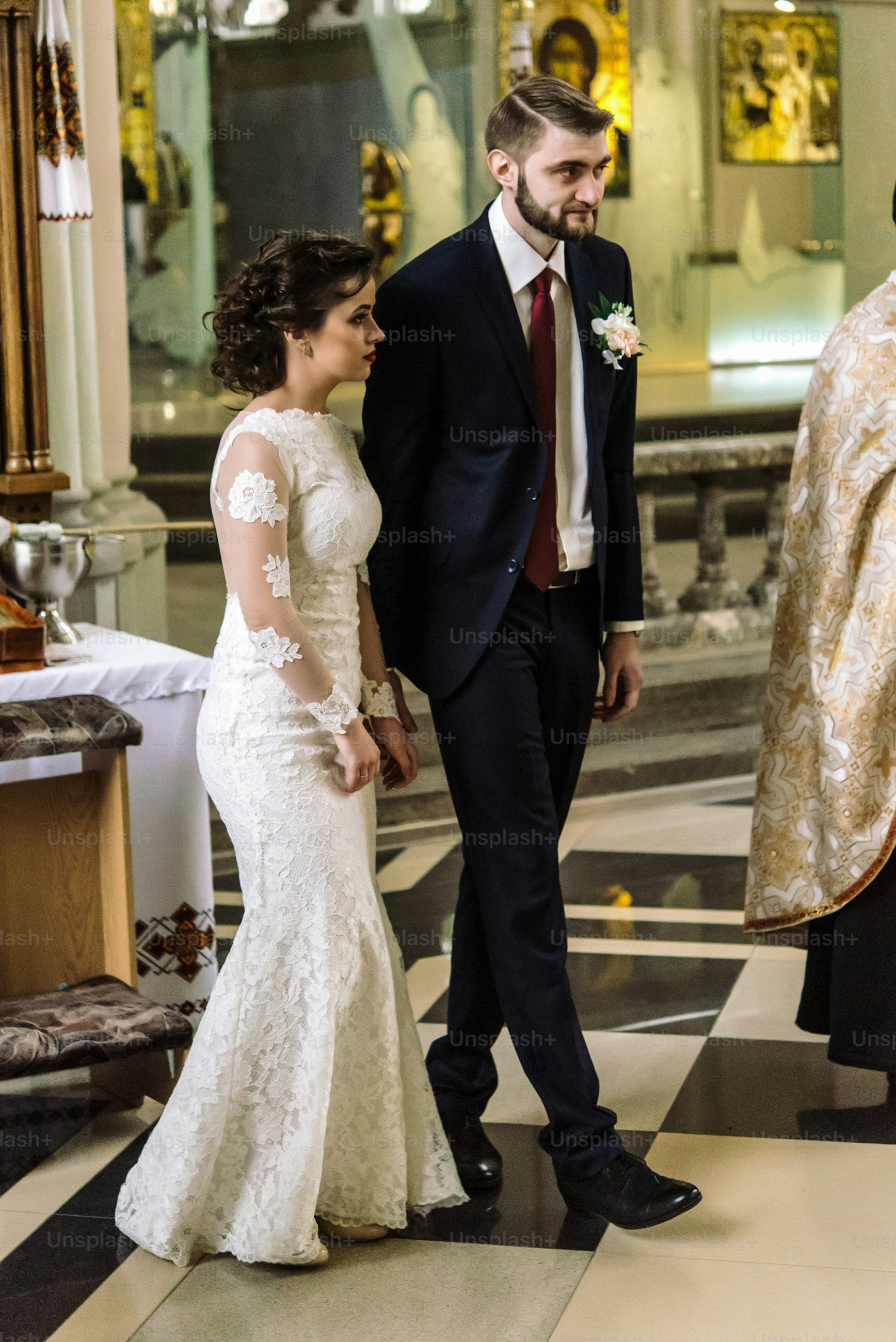 stylish luxury bride and elegant groom, making oaths, emotional traditional  wedding ceremony