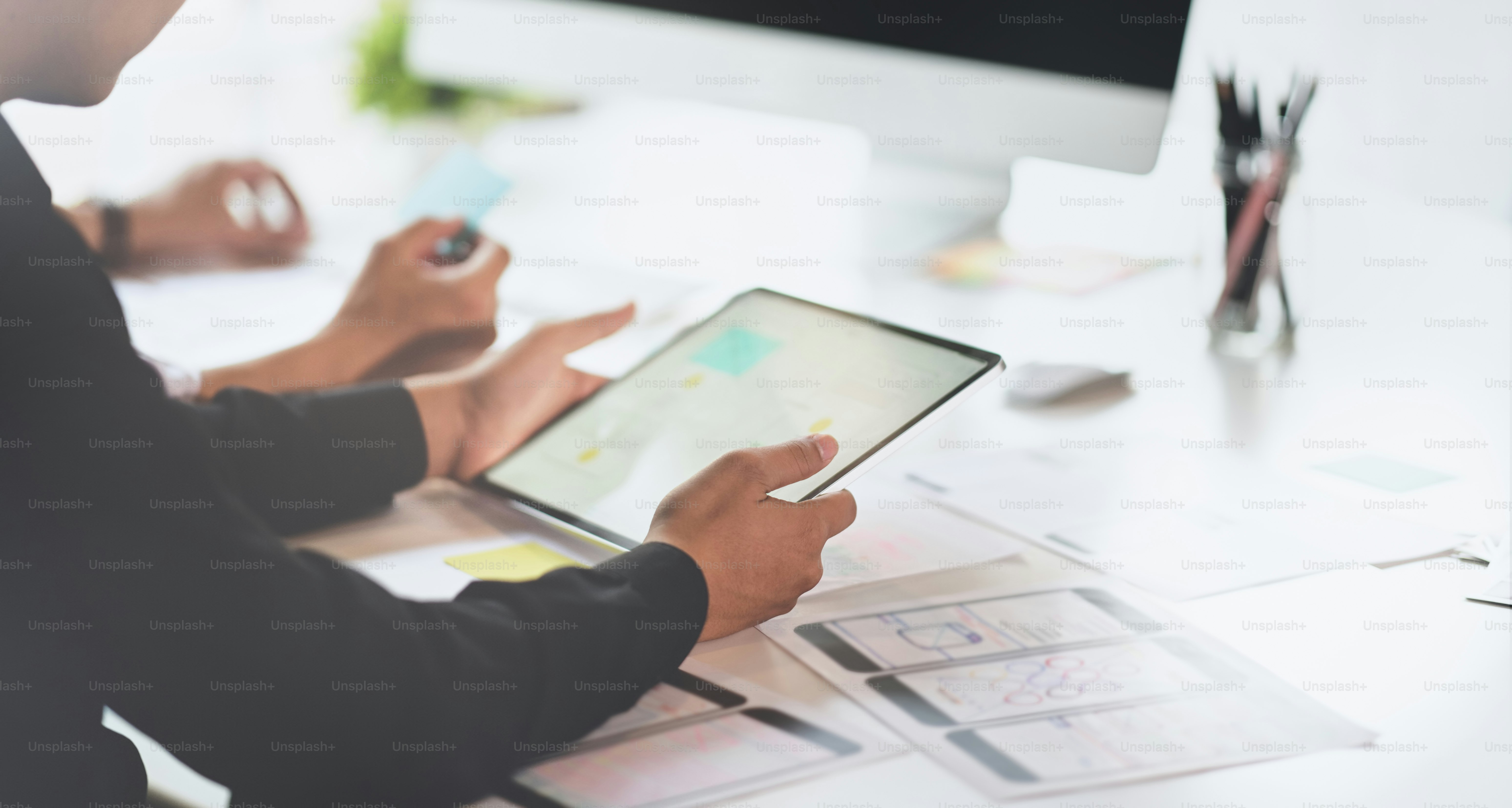 UI graphic designer team planing the concepts about UI templates