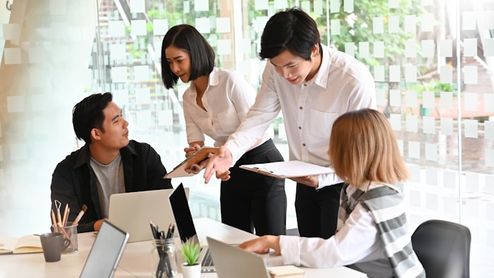 Asian startup team meeting