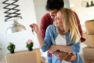 Happy couple after moving in to new home