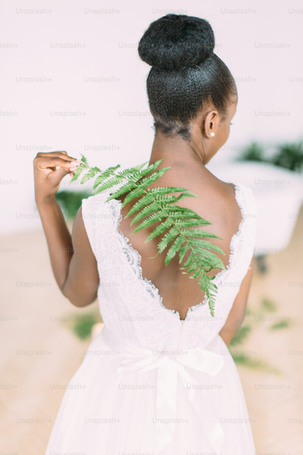 beautiful dark skin bride. Beautiful african american bride with fern.