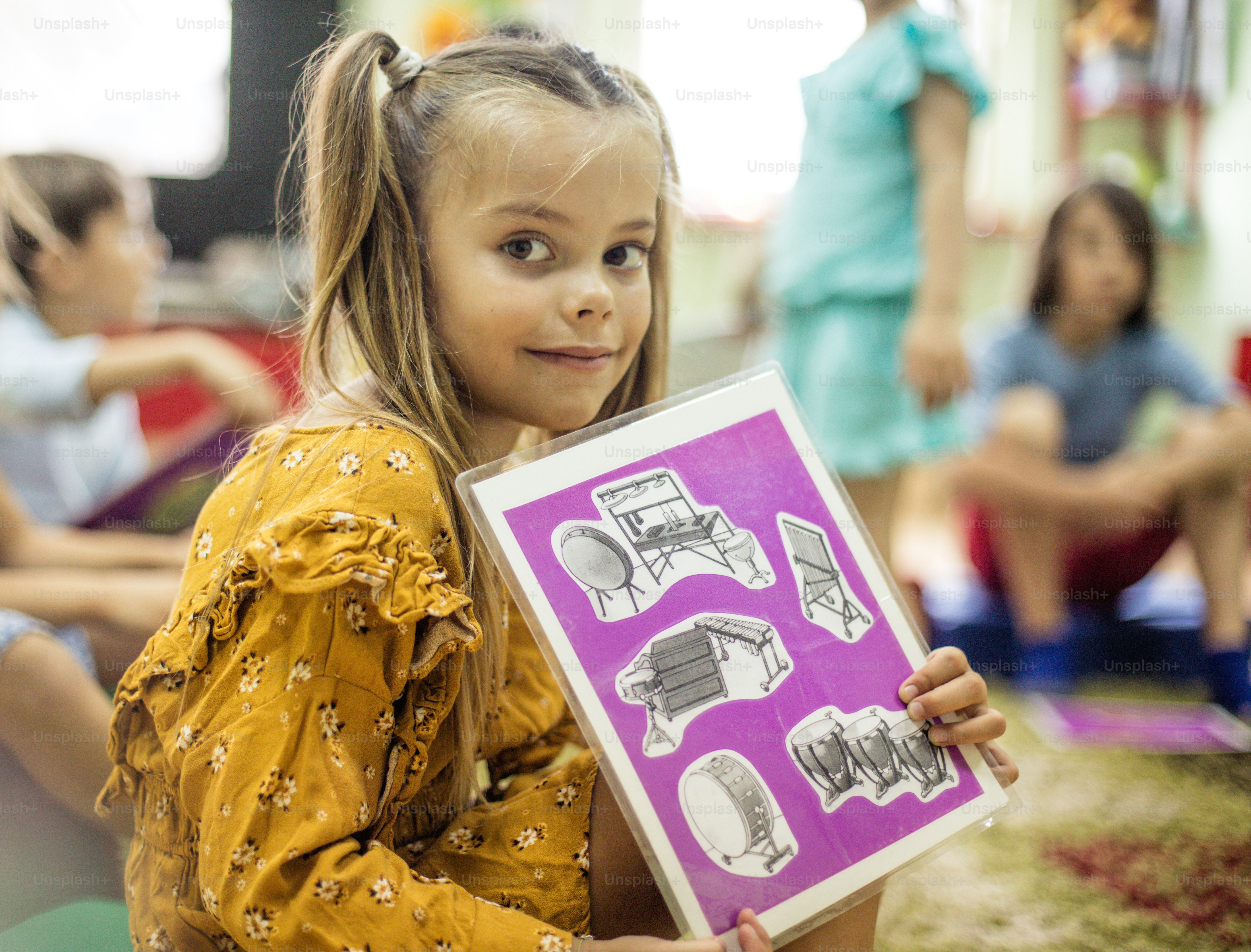 Lesson about instruments. Child in music school. photo – Girl Image on ...
