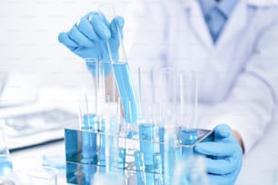 Researcher in the laboratory Studying with chemicals And microscopes