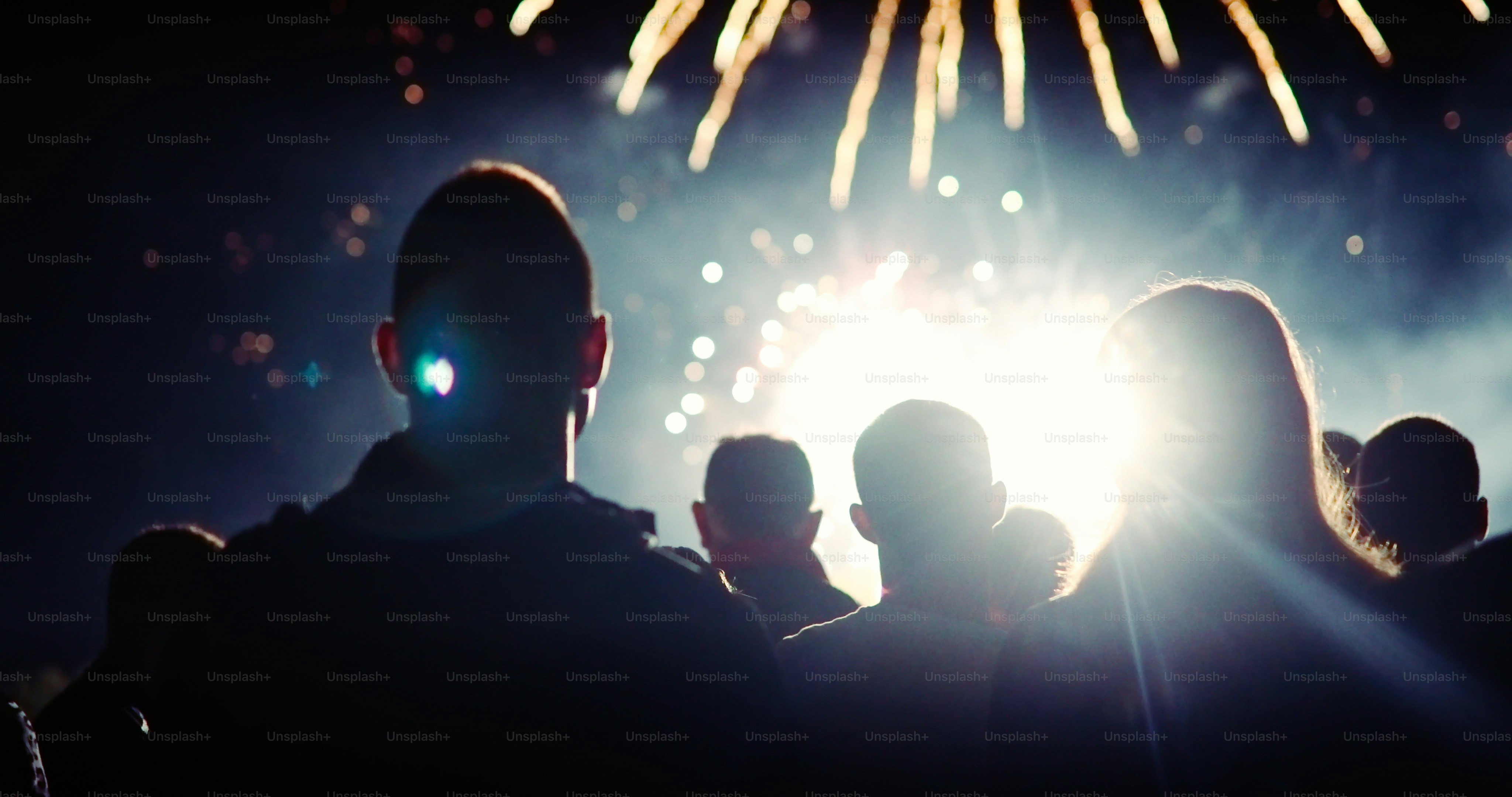 Crowd watching fireworks and celebrating new year