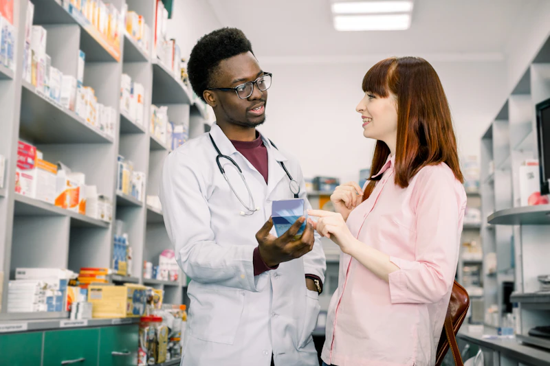Pharmacist reviewing medication options