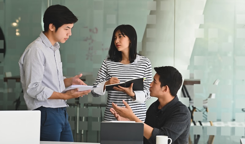 Small team collaborating in modern office