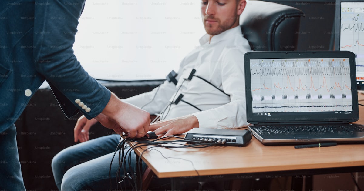 Your fingers please. Preparation for the polygraph test. Conception of ...