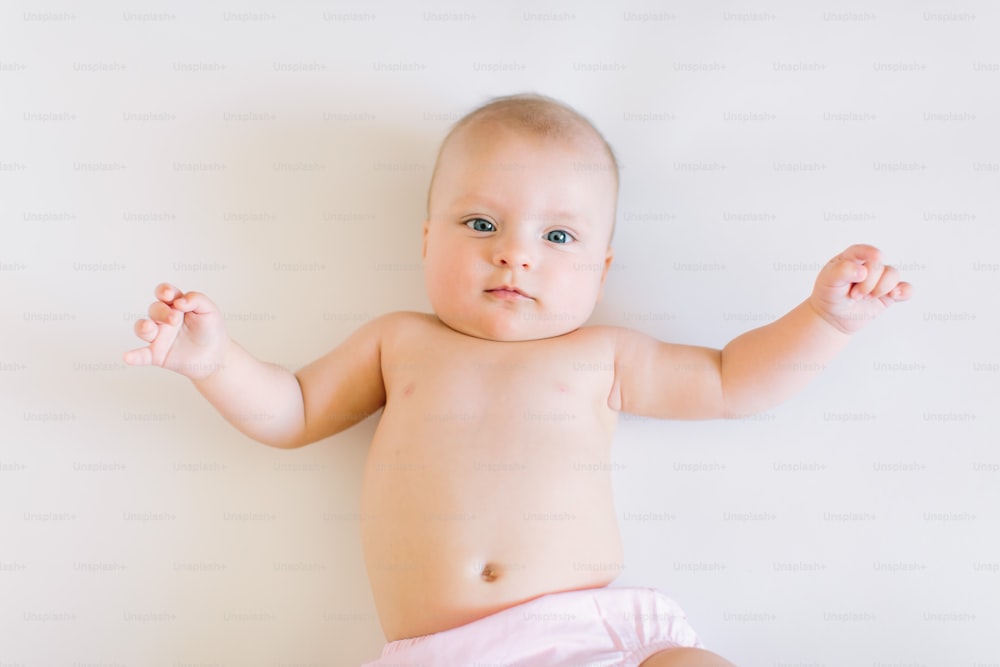 Cute baby on a white background.