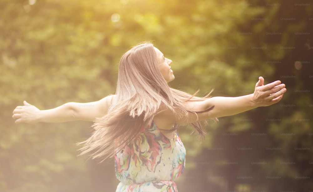 Feel the freedom on your skin. Woman in nature.