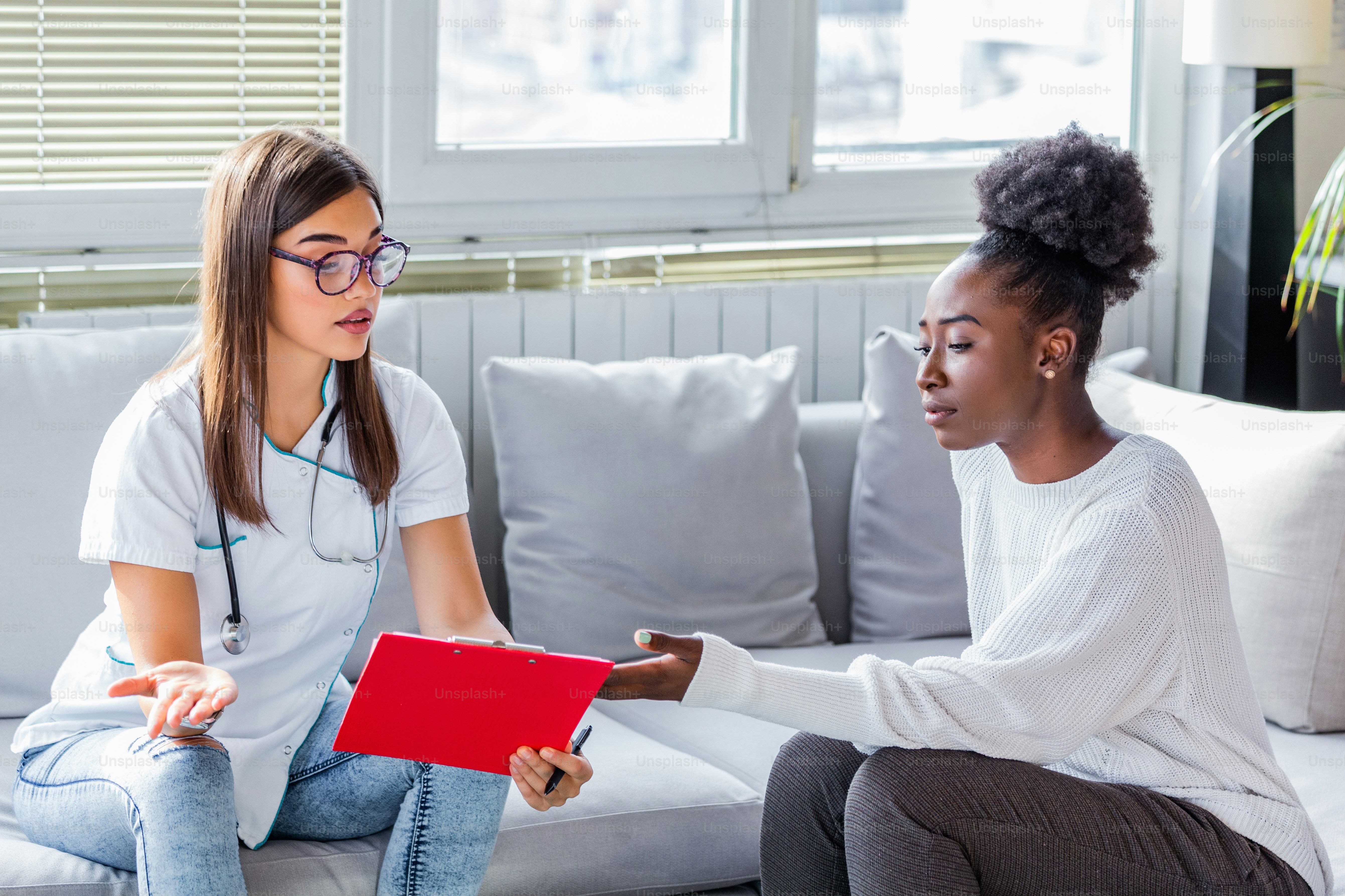 Woman doctor encouragement and supportive to cansor patient after ...