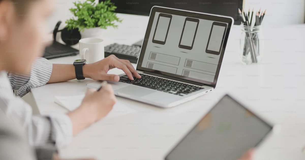 Cropped shot of young professional UX web developer working on ...
