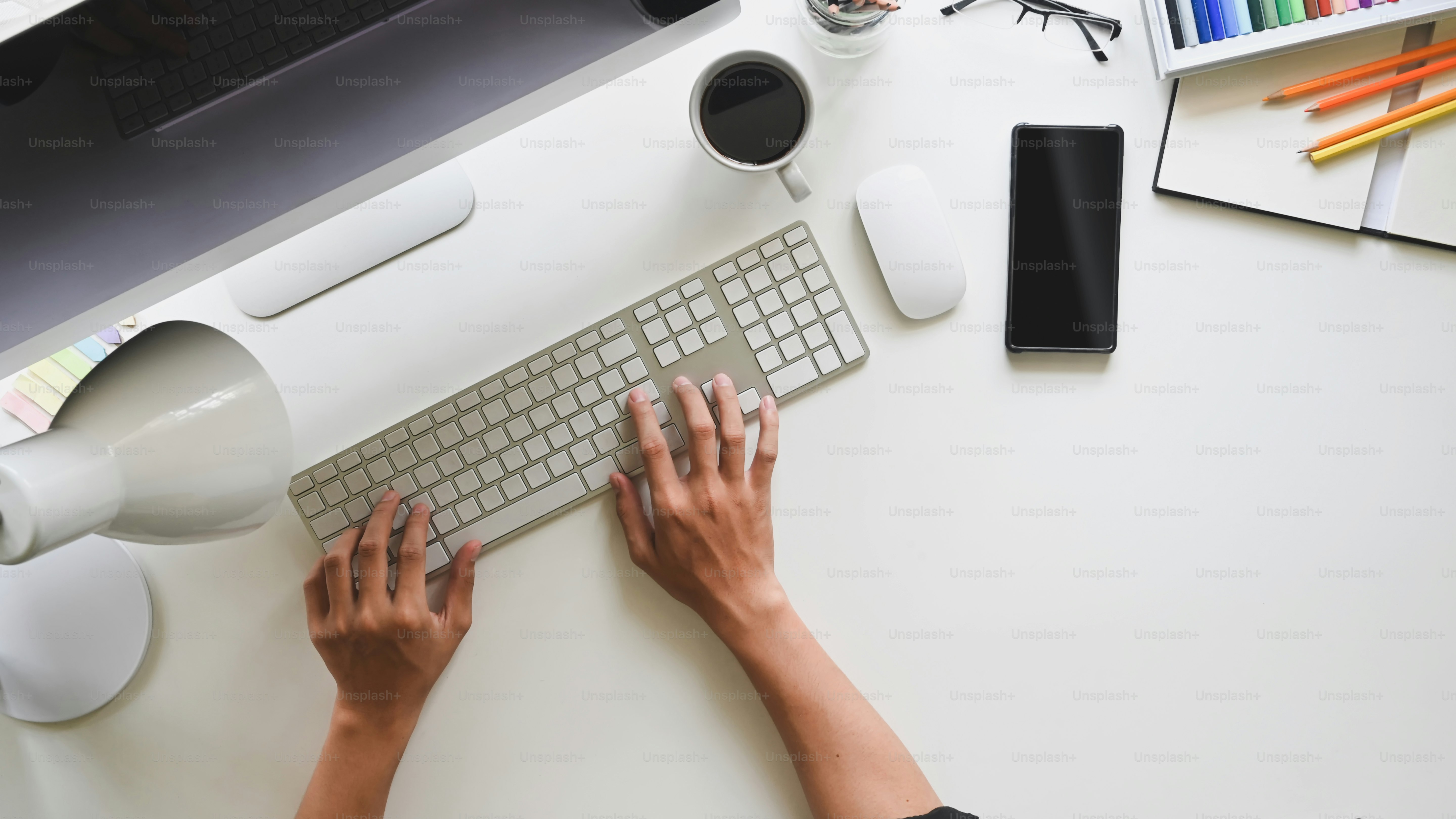 Workspace Male hands working on computer copy space office desk background.