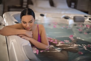 Young woman in Hot Tub.