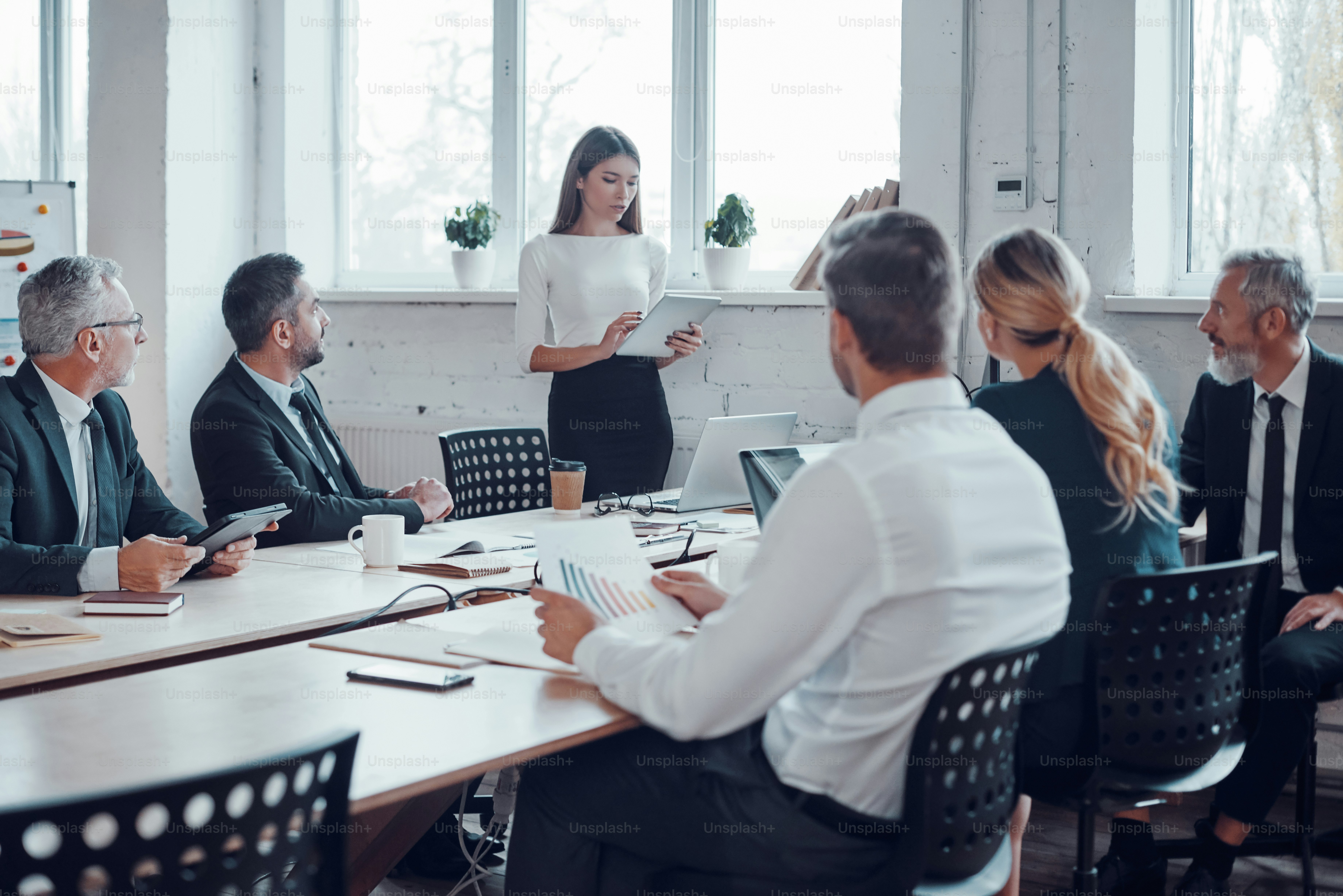 Professional business expert conducting meeting while working together ...