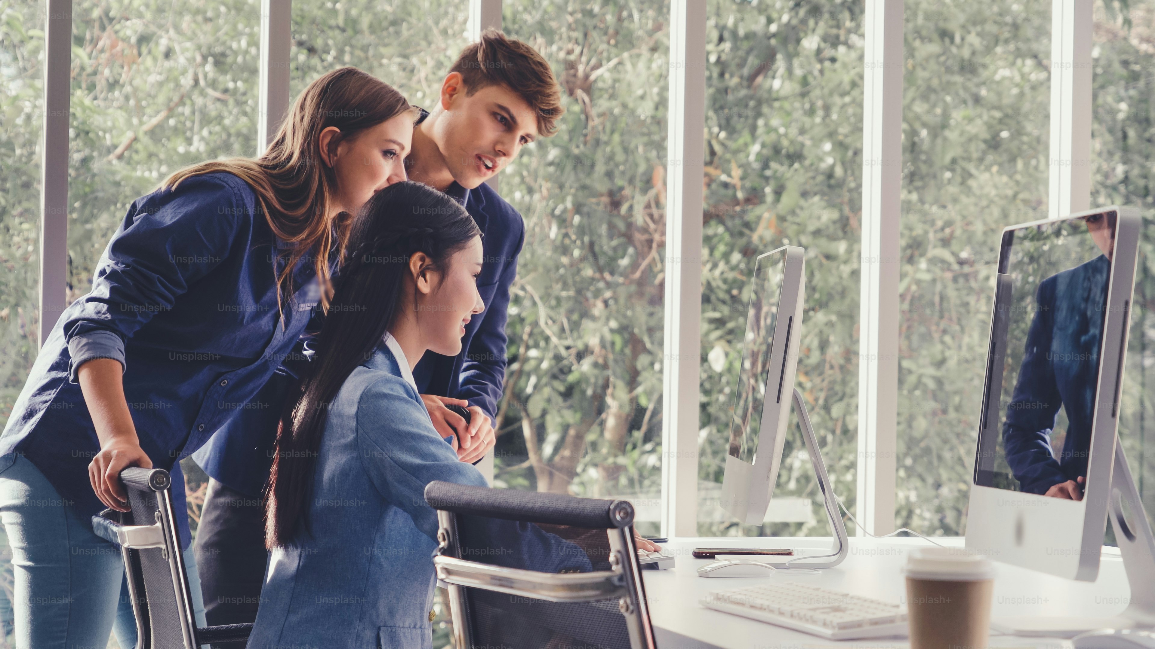 Happy businesswoman and businessman having conversation in modern office. Business corporate and community concept