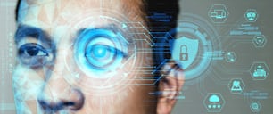 La futura protezione dei dati di sicurezza informatica mediante scansione biometrica con l'occhio umano per sbloccare e dare accesso ai dati digitali privati. Concetto futuristico di innovazione tecnologica.