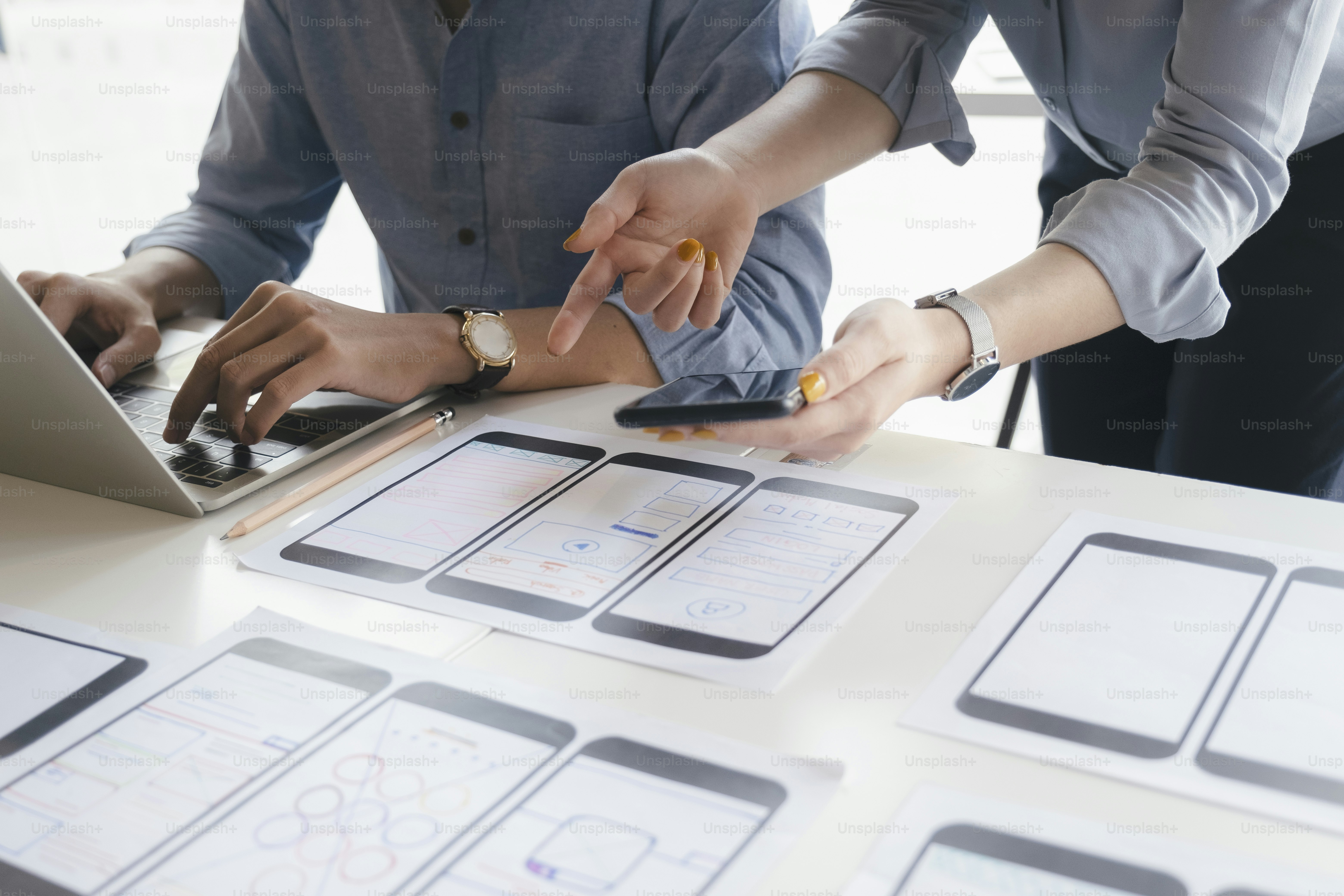 Programmer and UX UI designer working in a software development and ...