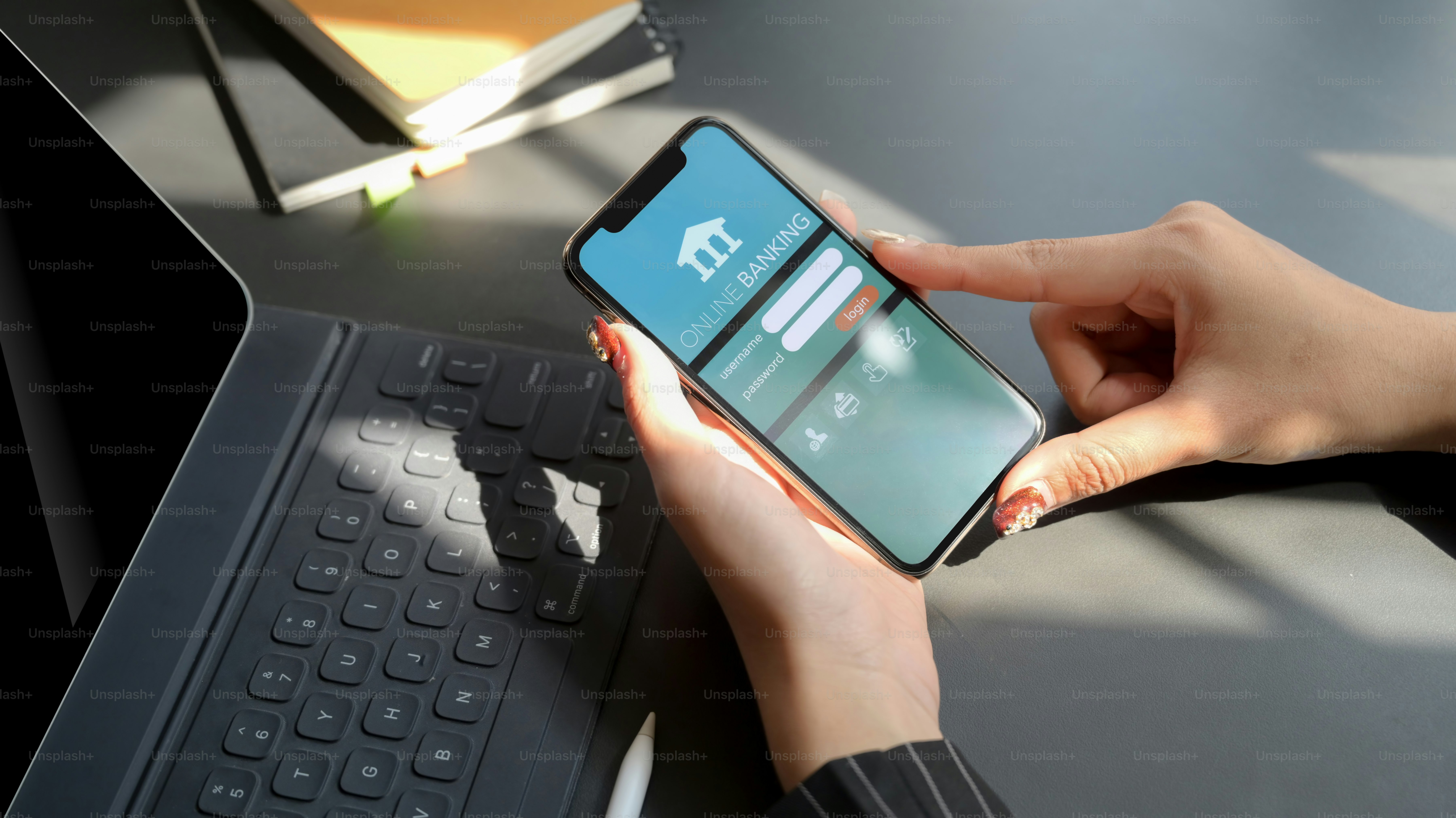 CHIANG MAI, THAILAND - JANUARY 31, 2020 : female holding iPhone with Online Banking screen. Online Banking helps manage money without having in your phone