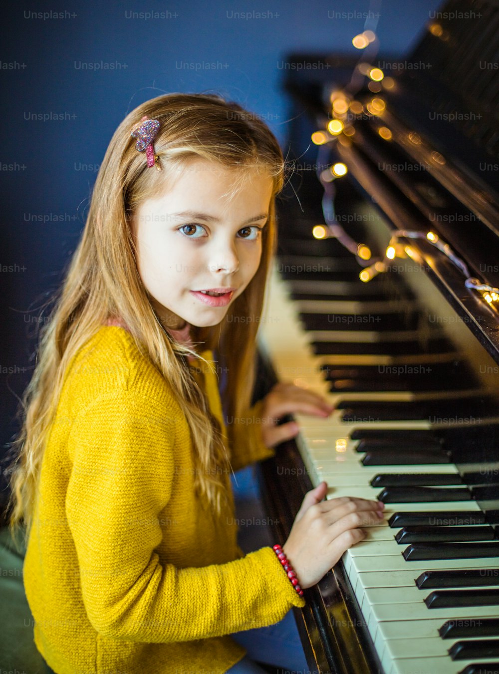 I was born to be a pianist. Little girl playing piano.