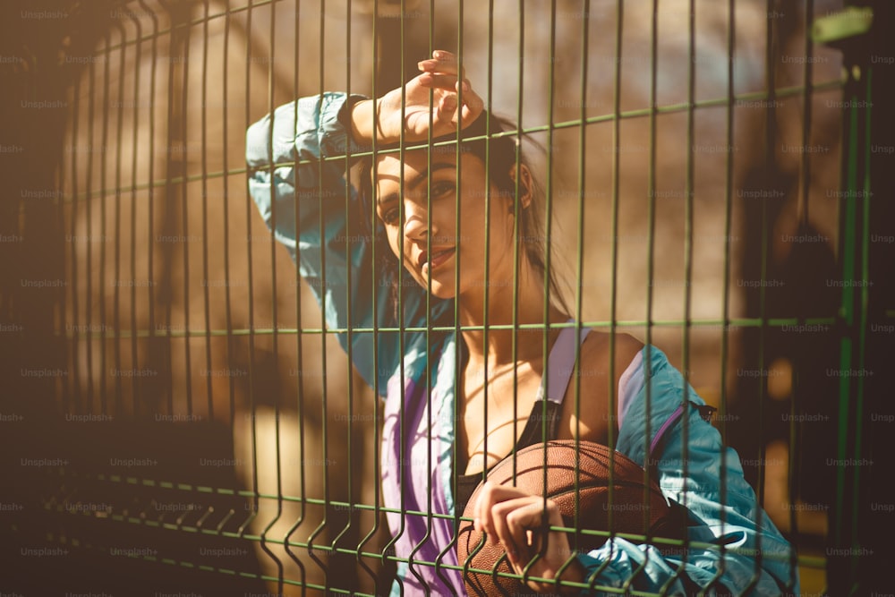 The weekend is reserved for sports. Portrait of woman holding ball.