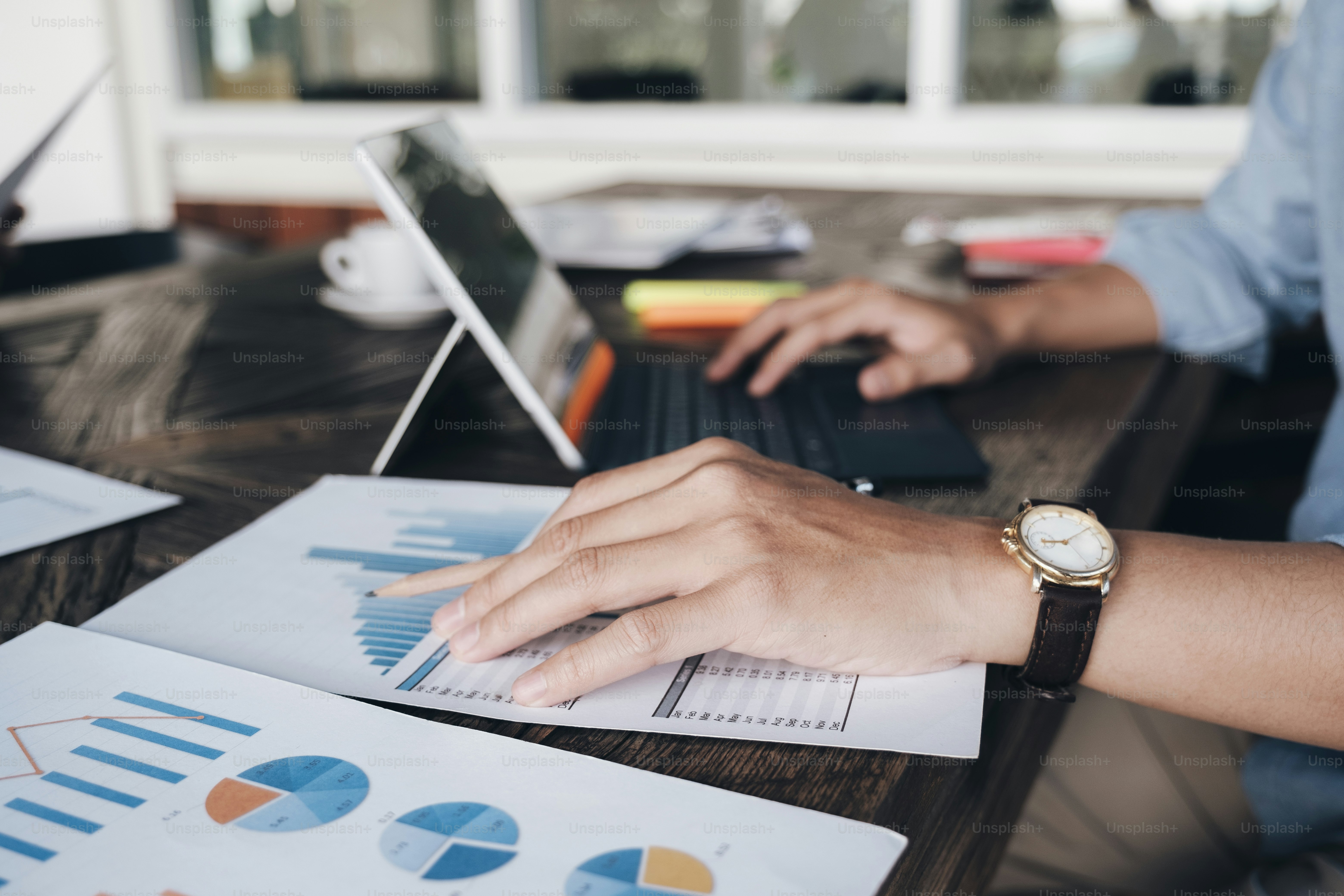 Businessman planning and analyse investment marketing data.