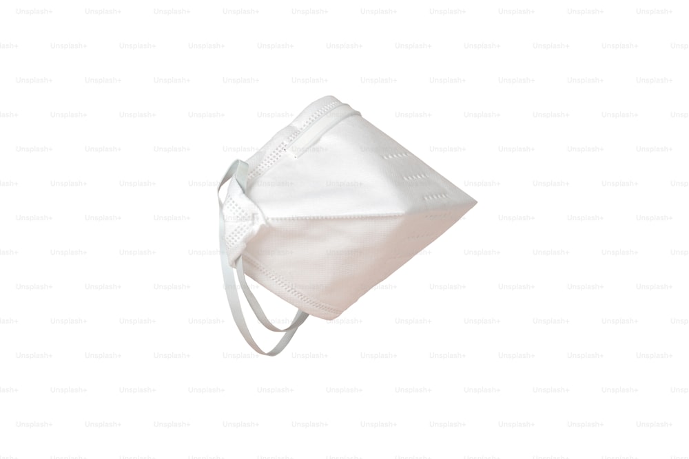 Cut out white protective medical mask isolated on transparent background with copy space. Advertising of face respirator and medical fitler equipment
