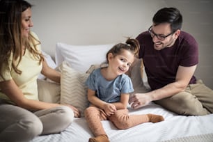 We're just a happy family. Parents with daughter at home.