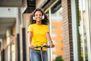 Young african woman outdoors. Beautiful young woman enjoying outdoor.