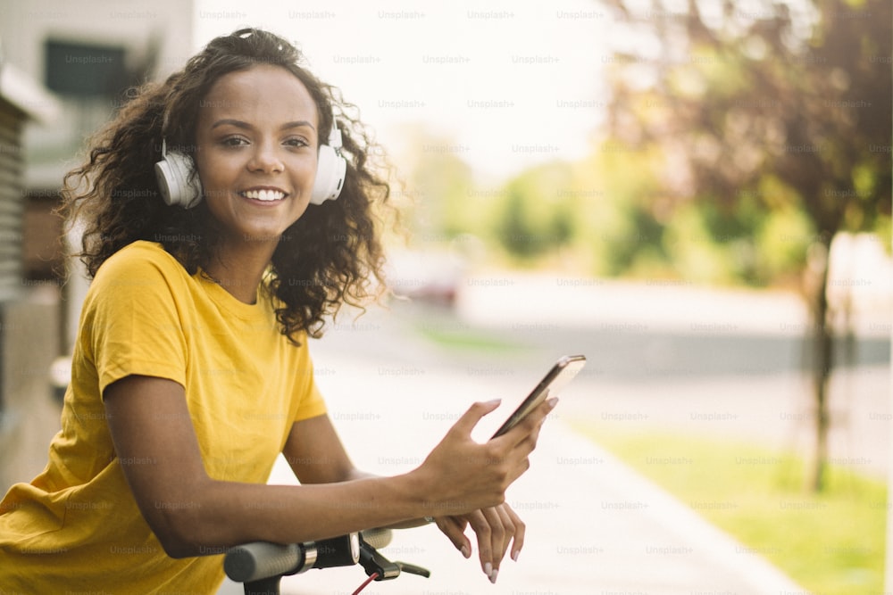 Young african woman outdoors. Beautiful young woman enjoying outdoor.