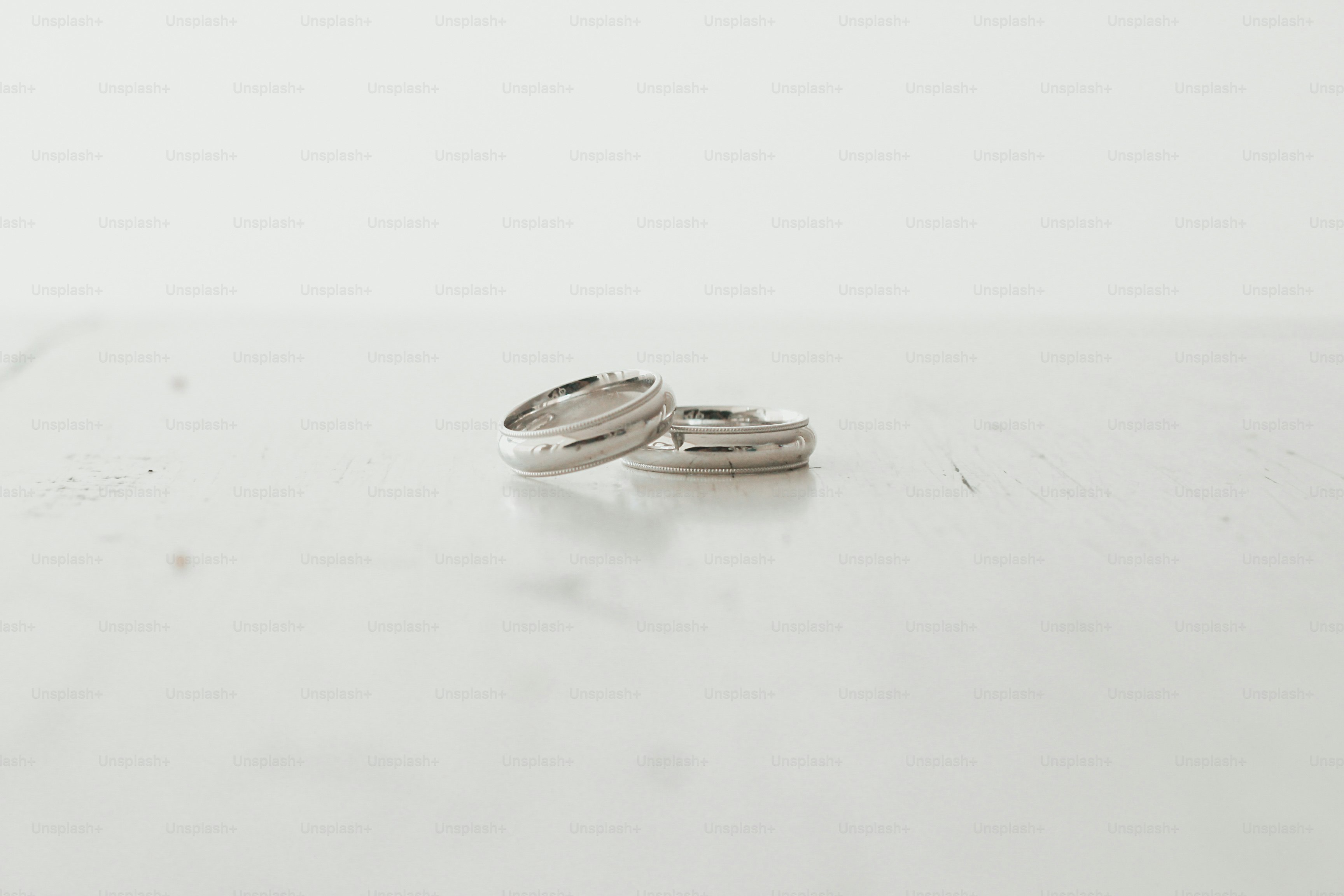 wedding rings on a white background