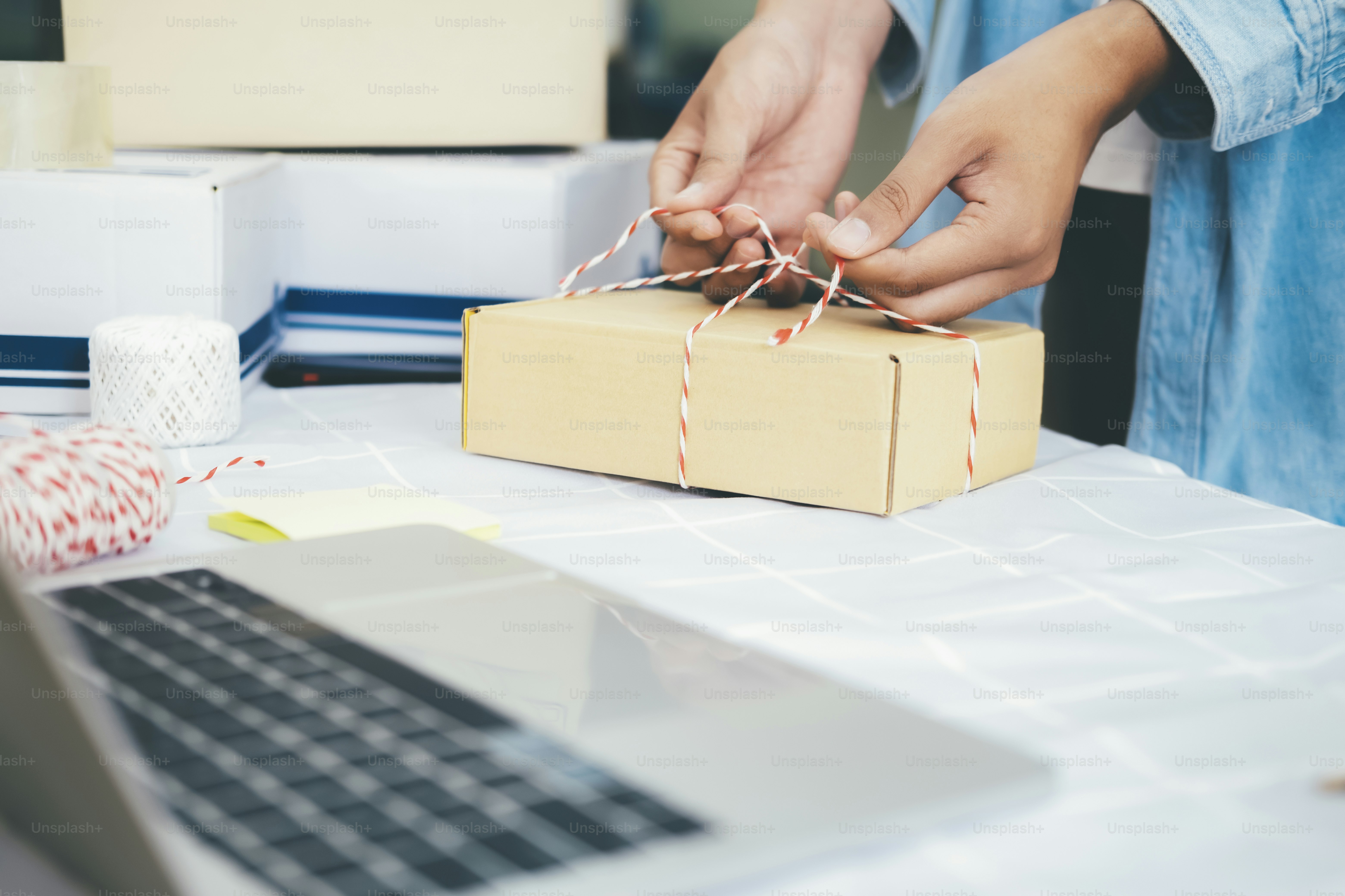 Online small business owner. Young startup entrepreneur online small business owner working at home, packaging and delivery situation.