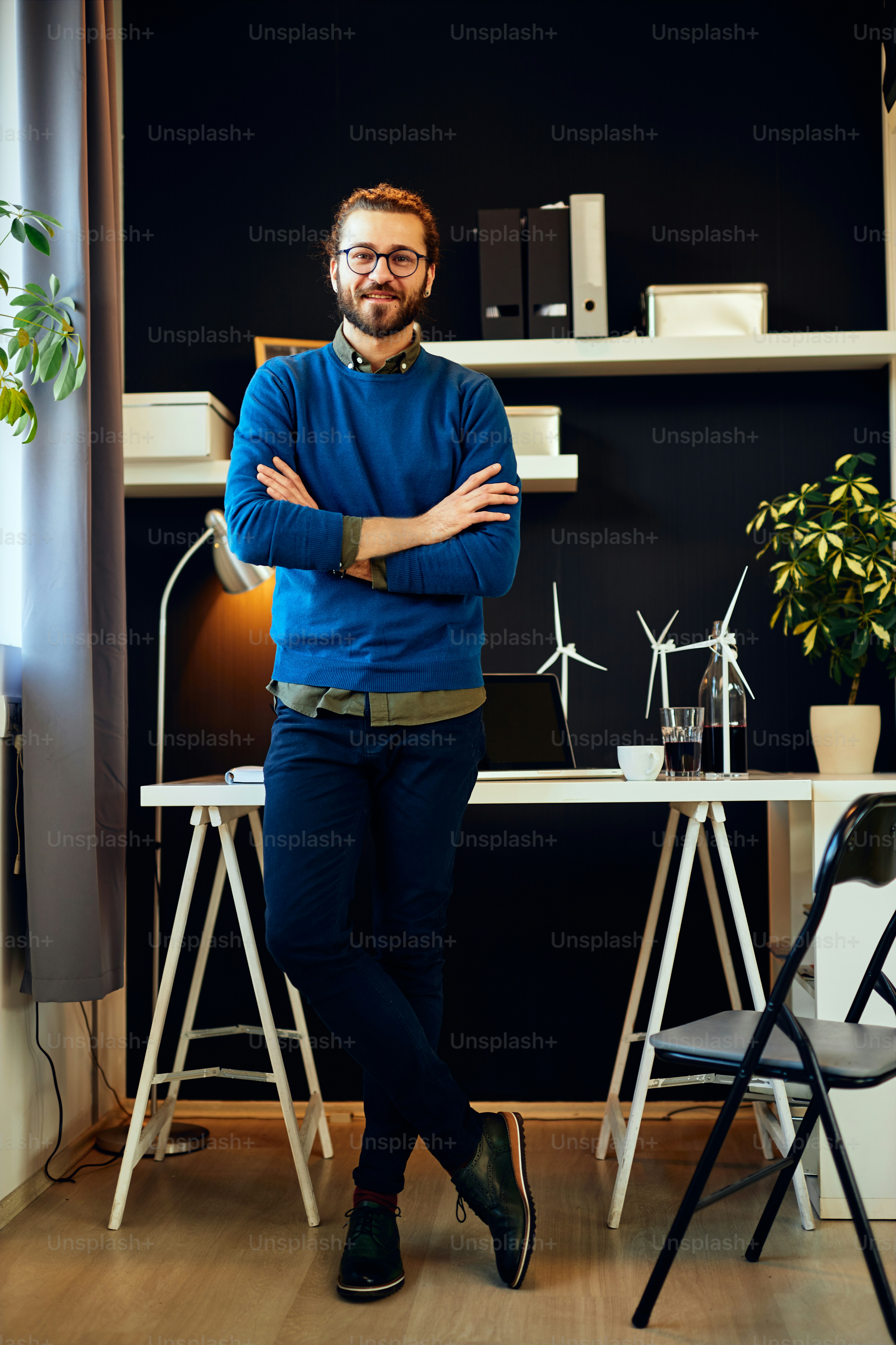 Professional using executive energy management strategies while working at a standing desk