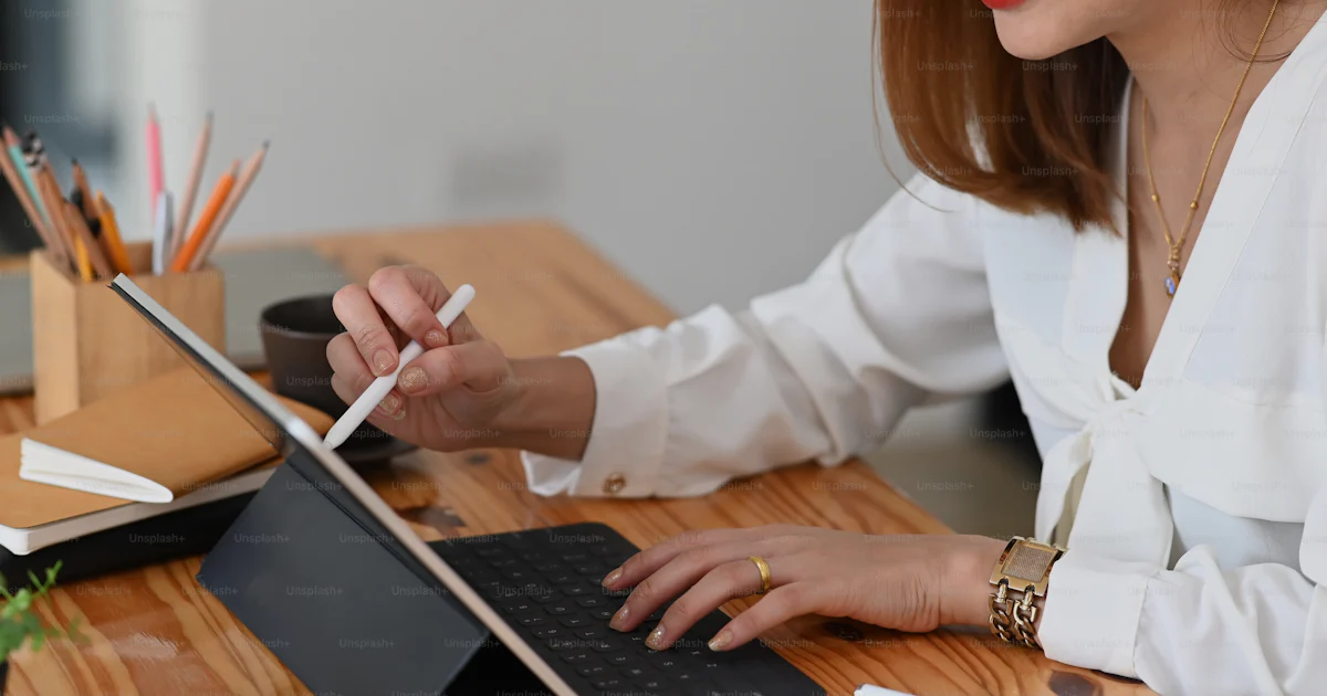 Computer Stylist Photo of stylist woman designing a new project by using a stylus pen ...