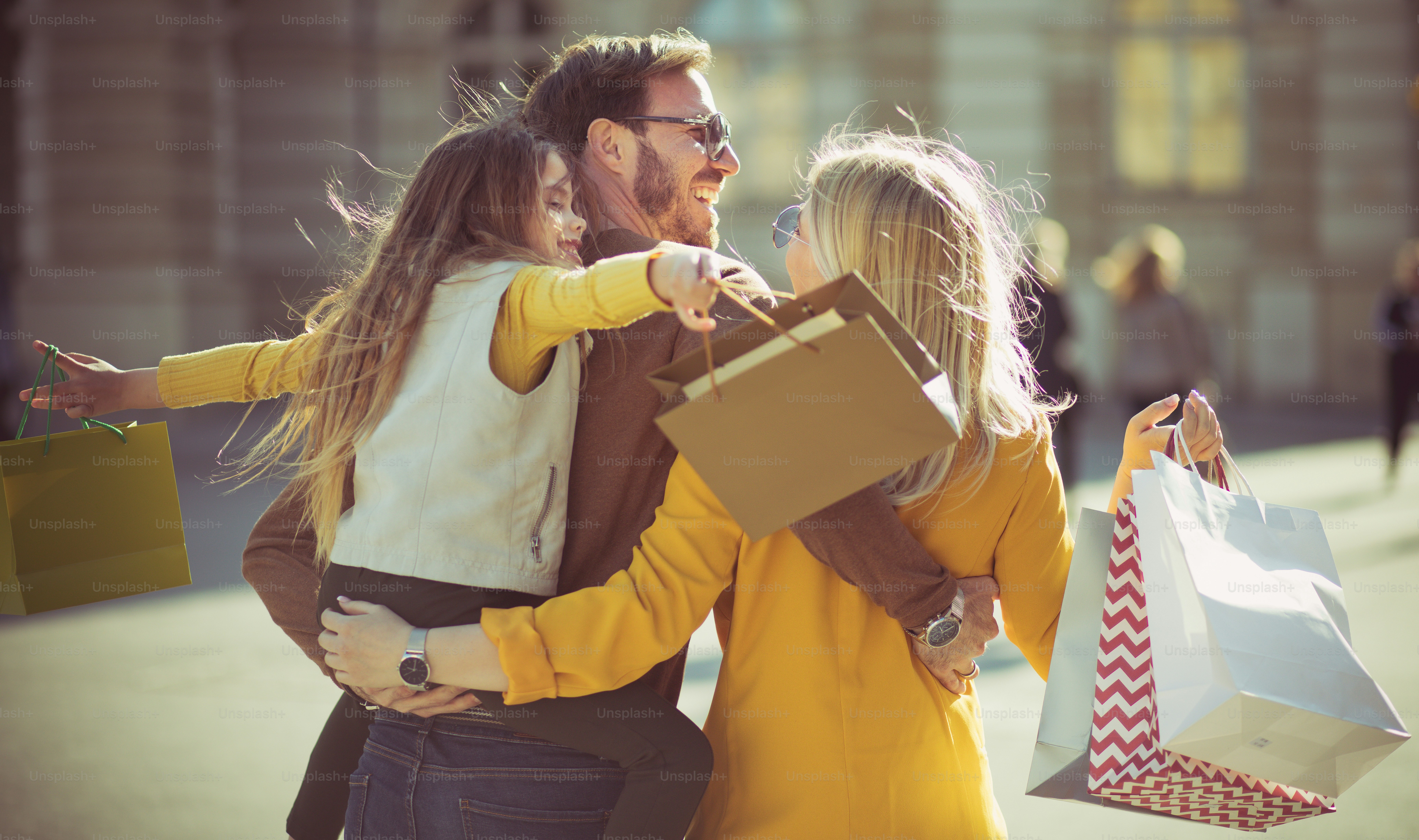 Go home after shopping. Family shopping in the city. photo – Springtime ...