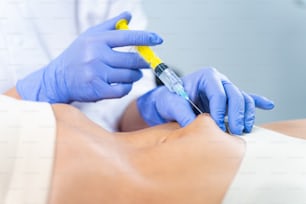 Cropped photo of a female patient getting rid of unwanted fat deposits in the problem area