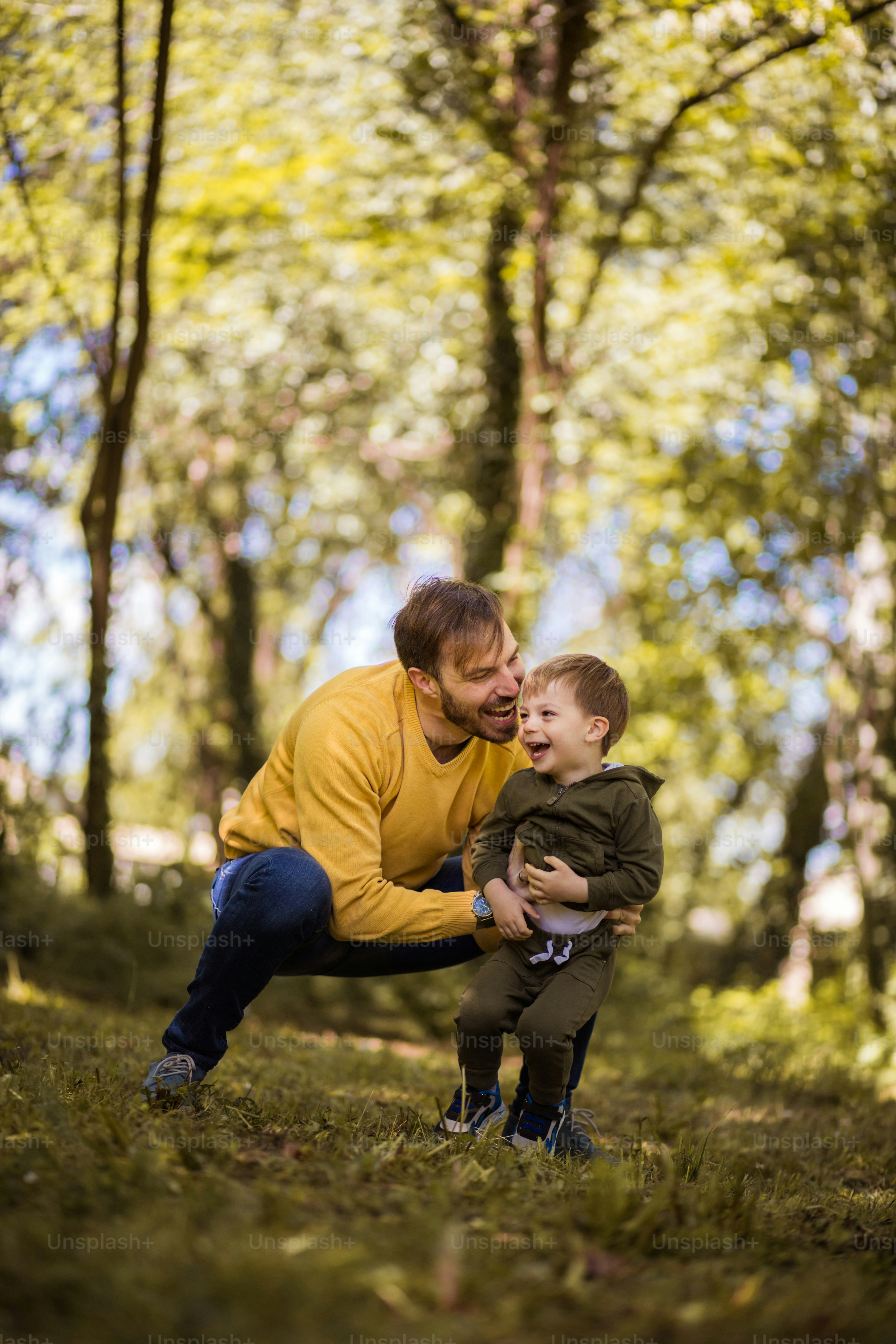 Being there for his son every step of the way. Father spending time with his son outside.