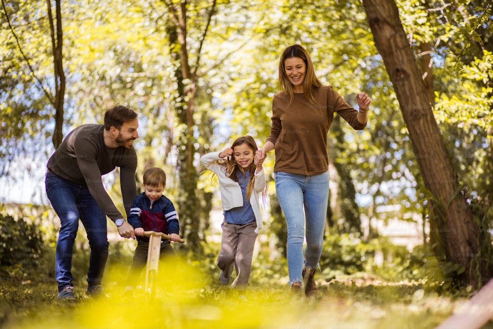 This spring is full of fun. Parents spending time with their children outside.