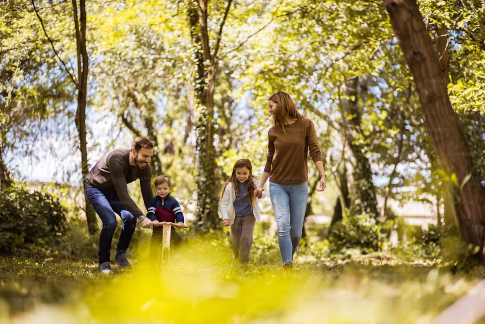 Time for a family adventure. Parents spending time with their children outside.