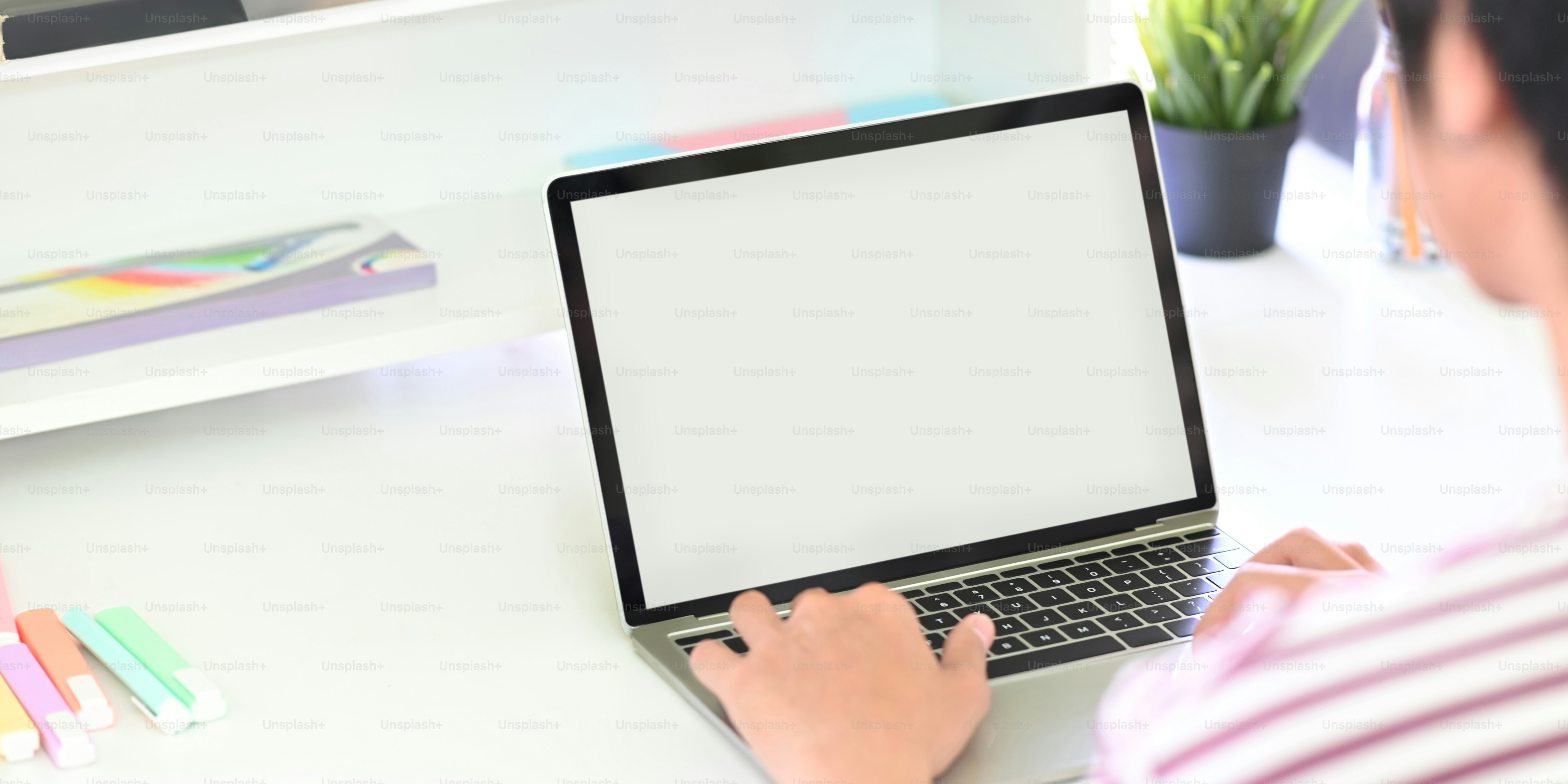 Cropped shot creative man using mockup laptop computer in home office ...