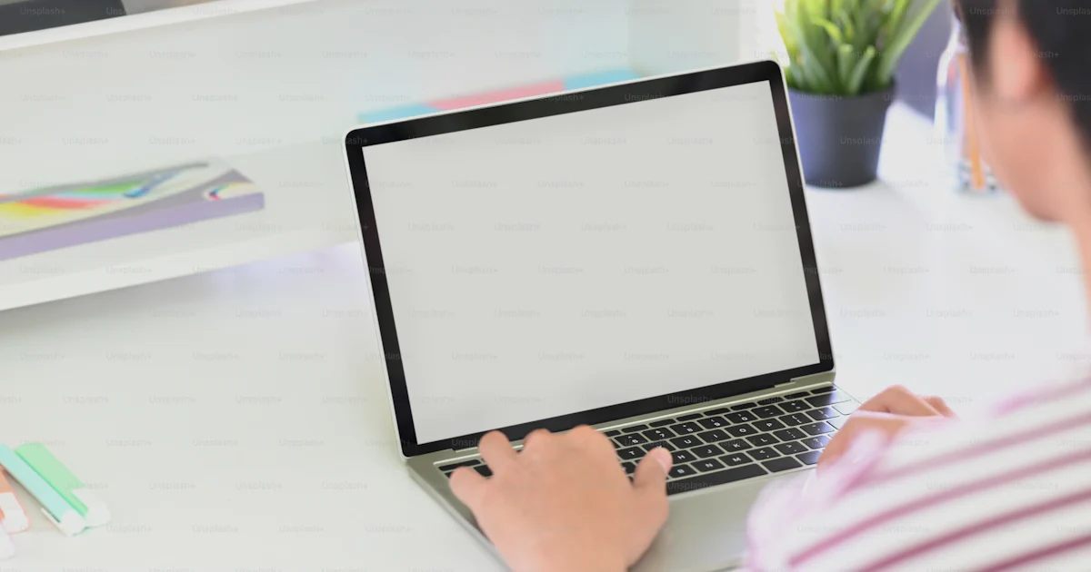 Unsplash Main Using Computer Cropped shot creative man using mockup laptop computer in home office ...