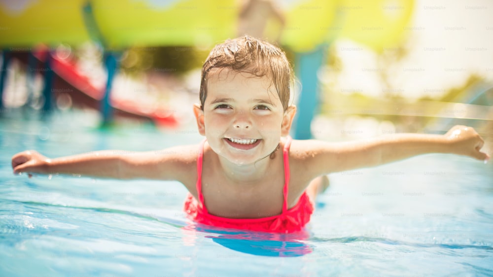 Summer is wonderful. Child in pool.