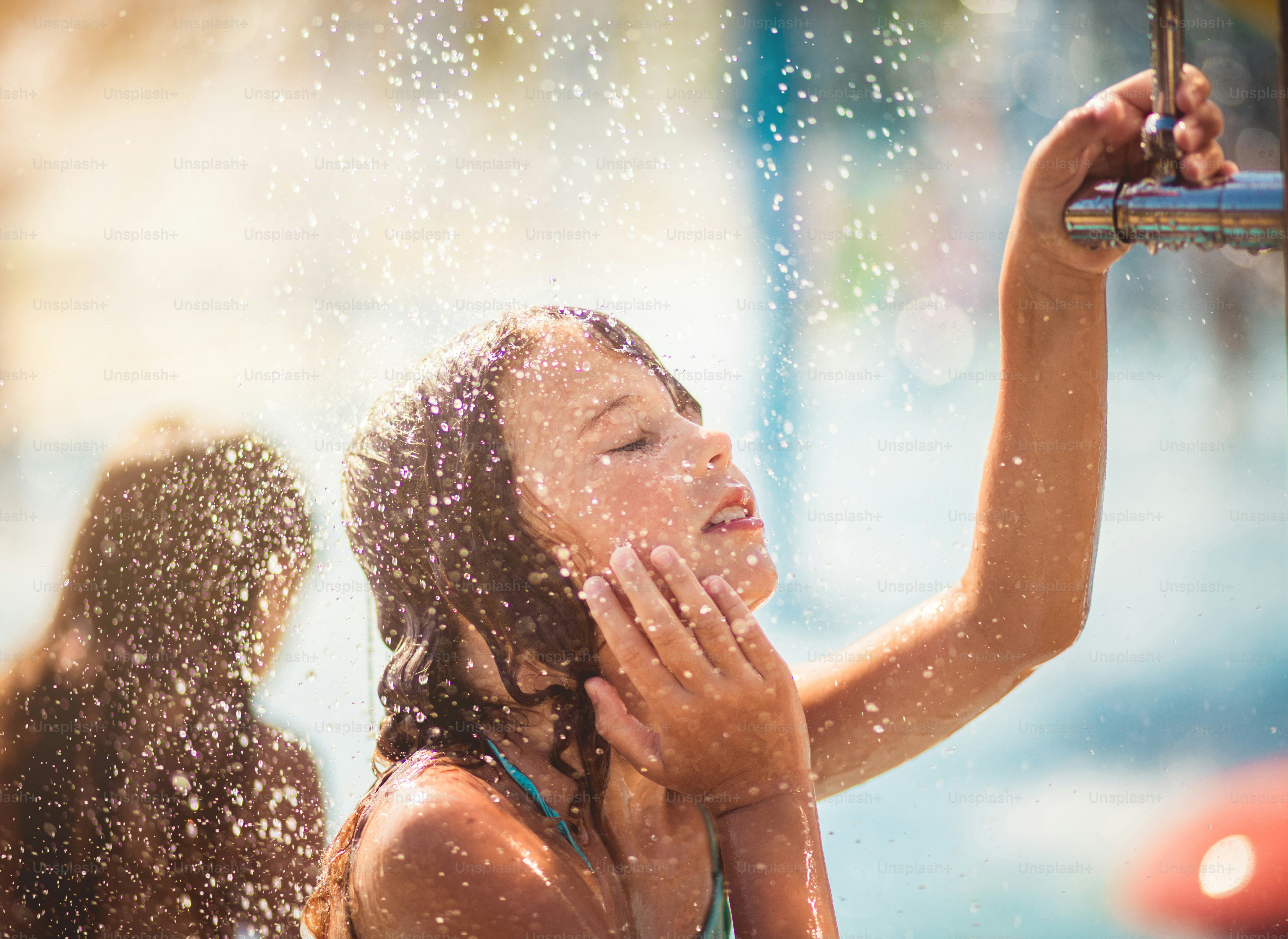 This is so good. Child showering. photo Water Image on Unsplash
