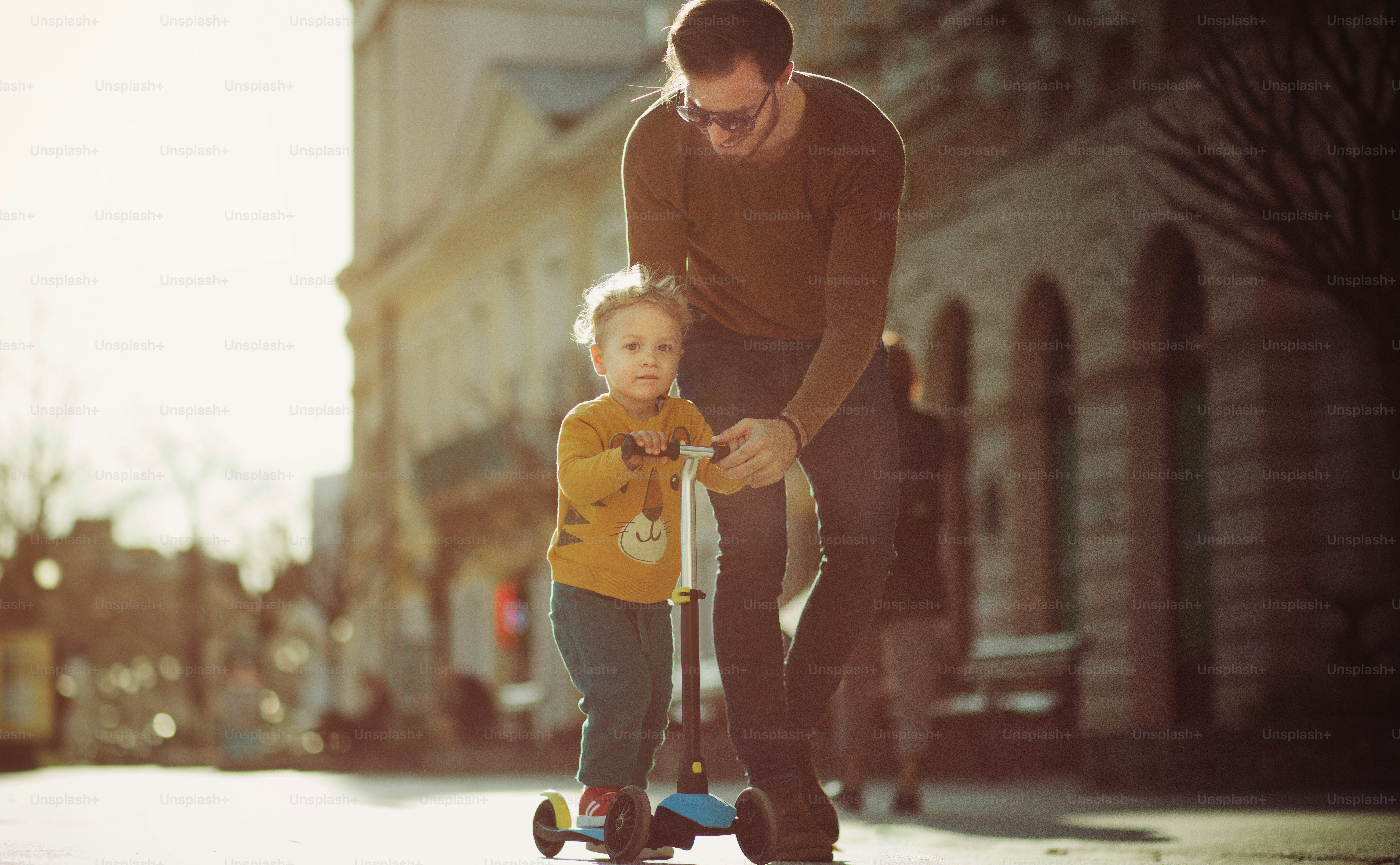 Let them be independent. Father and son in the city.