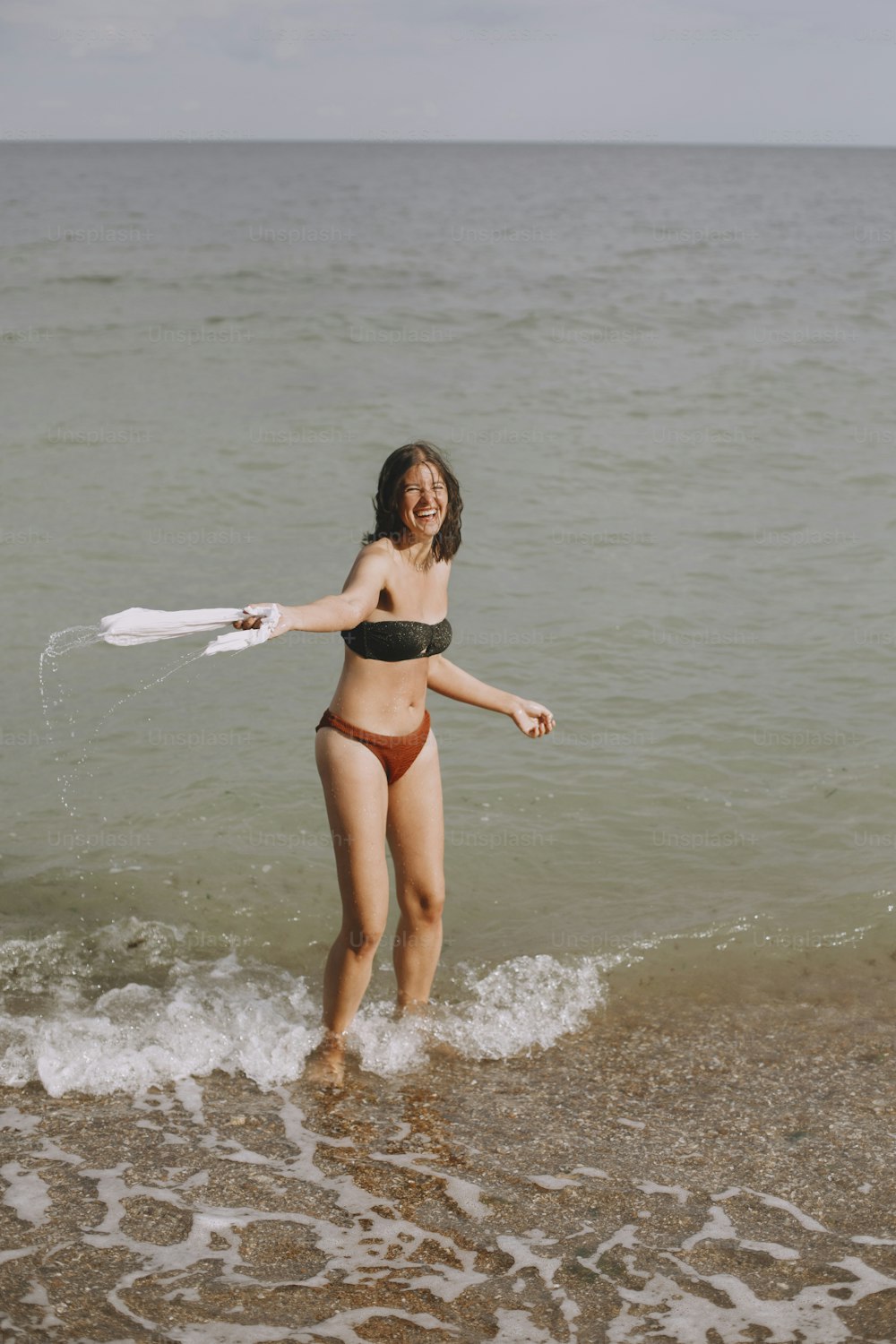 Premium Photo  Bikini body achieved full length shot of a gorgeous young  woman wearing a bikini on the beach