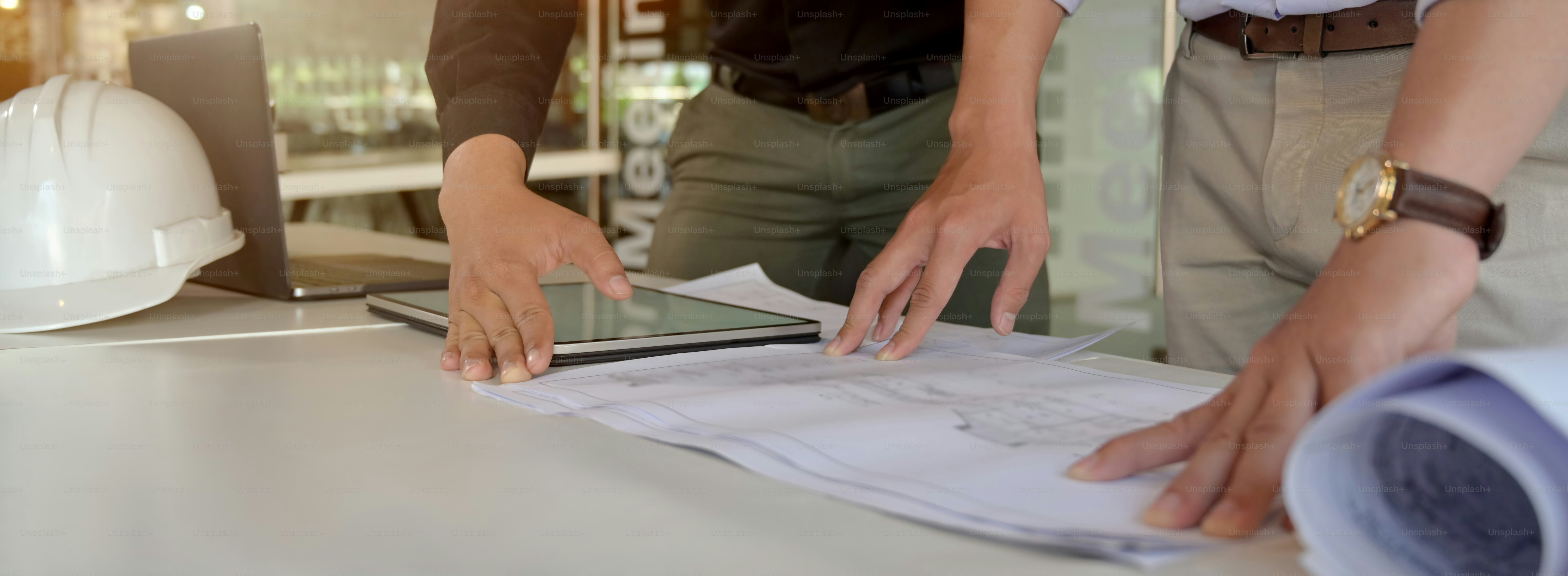 Tall image of worker checking Gujarati safety instructions