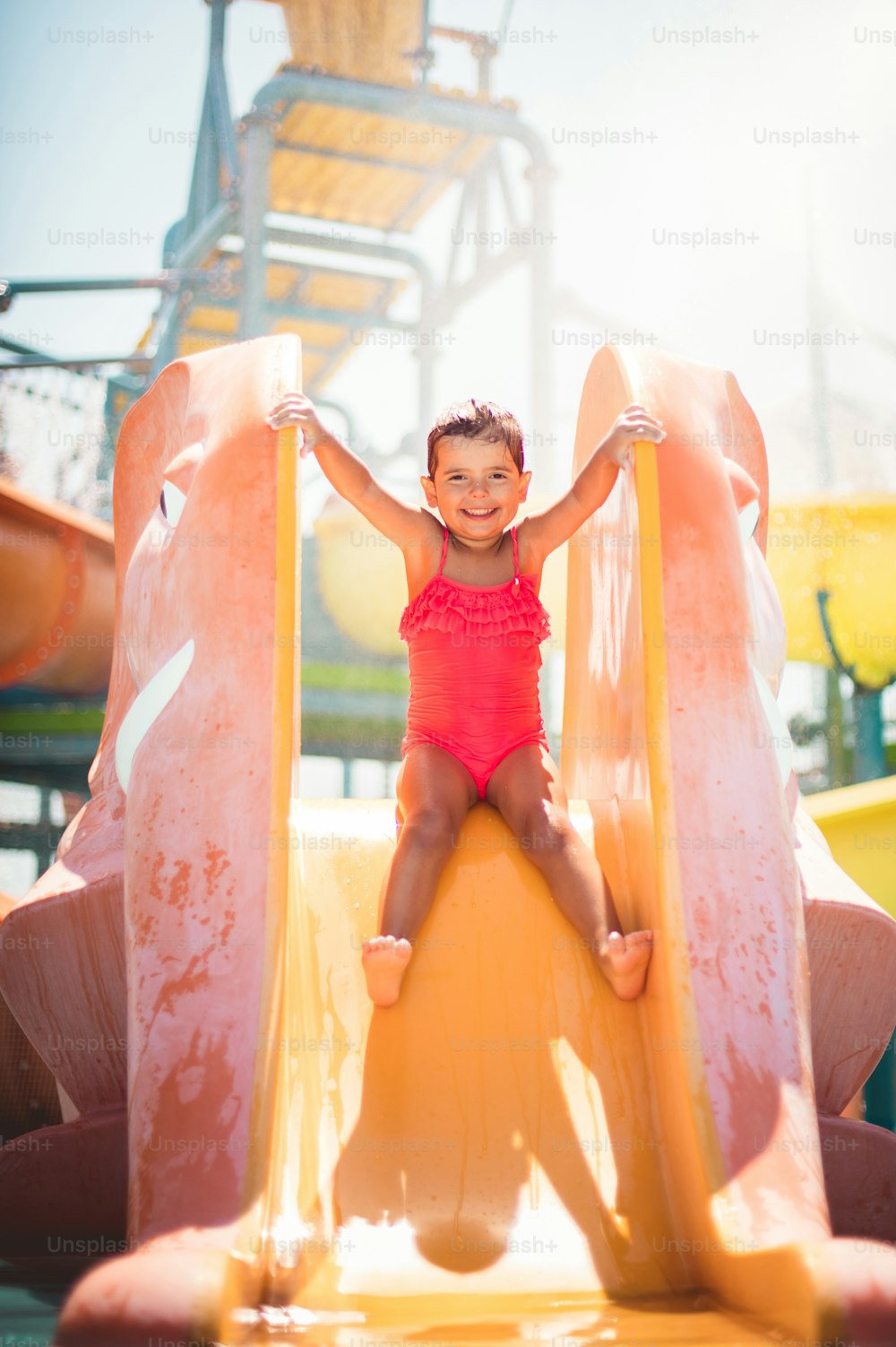 Day for fun. Little girl in pool.