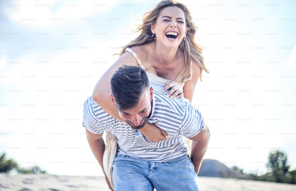 Days to remember. Couple on sand.