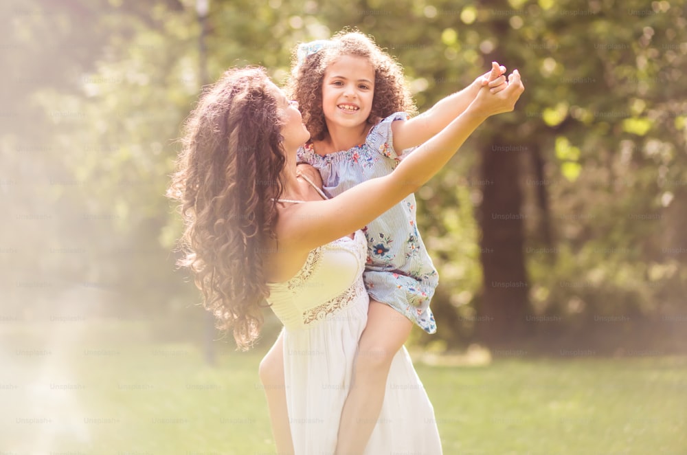 Fun times. Mother and daughter in nature.